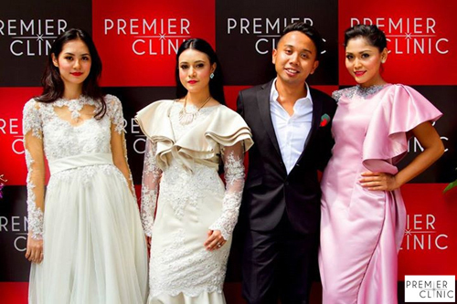 Famous 8TV Personality /Host Baki Zainal posing with models wearing dress from Baim Zamani Couture